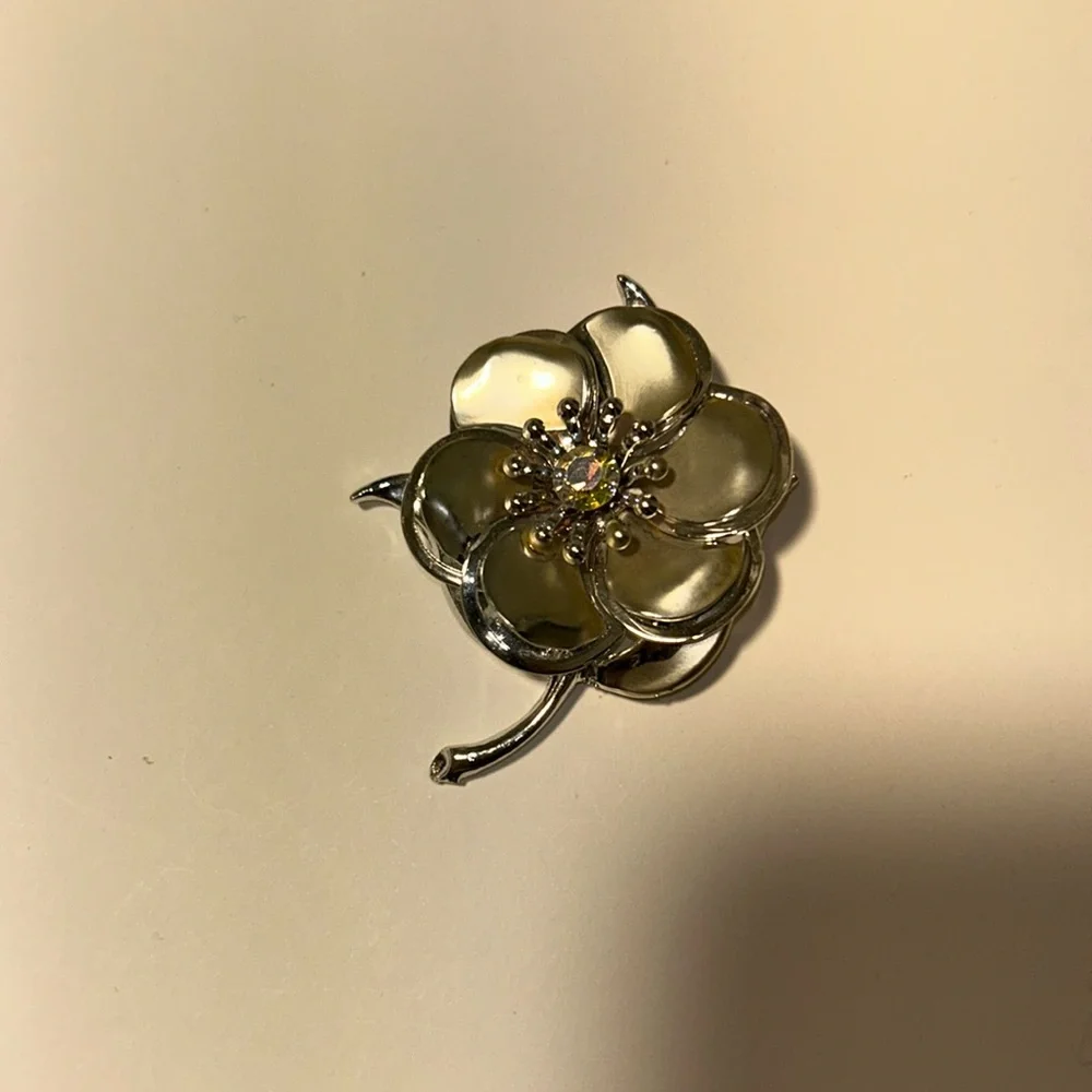 Silver Matte and Glossy Flower Brooch with a Aurora borealis Crystal